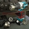 Makita DTW1001RTJ Akkus ütvecsavarozó (18V/2x5.0Ah) MAKPAC kofferben + AJÁNDÉK