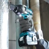 Makita DTW700RTJ Akkus ütvecsavarozó (18V/2x5.0Ah) MAKPAC kofferben + AJÁNDÉK