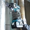 Makita DTW701RTJ Akkus ütvecsavarozó (18V/2x5.0Ah) MAKPAC kofferben + AJÁNDÉK