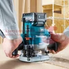 Makita RP001GM201 akkus Felsőmaró 40V max XGT faipari munka közben